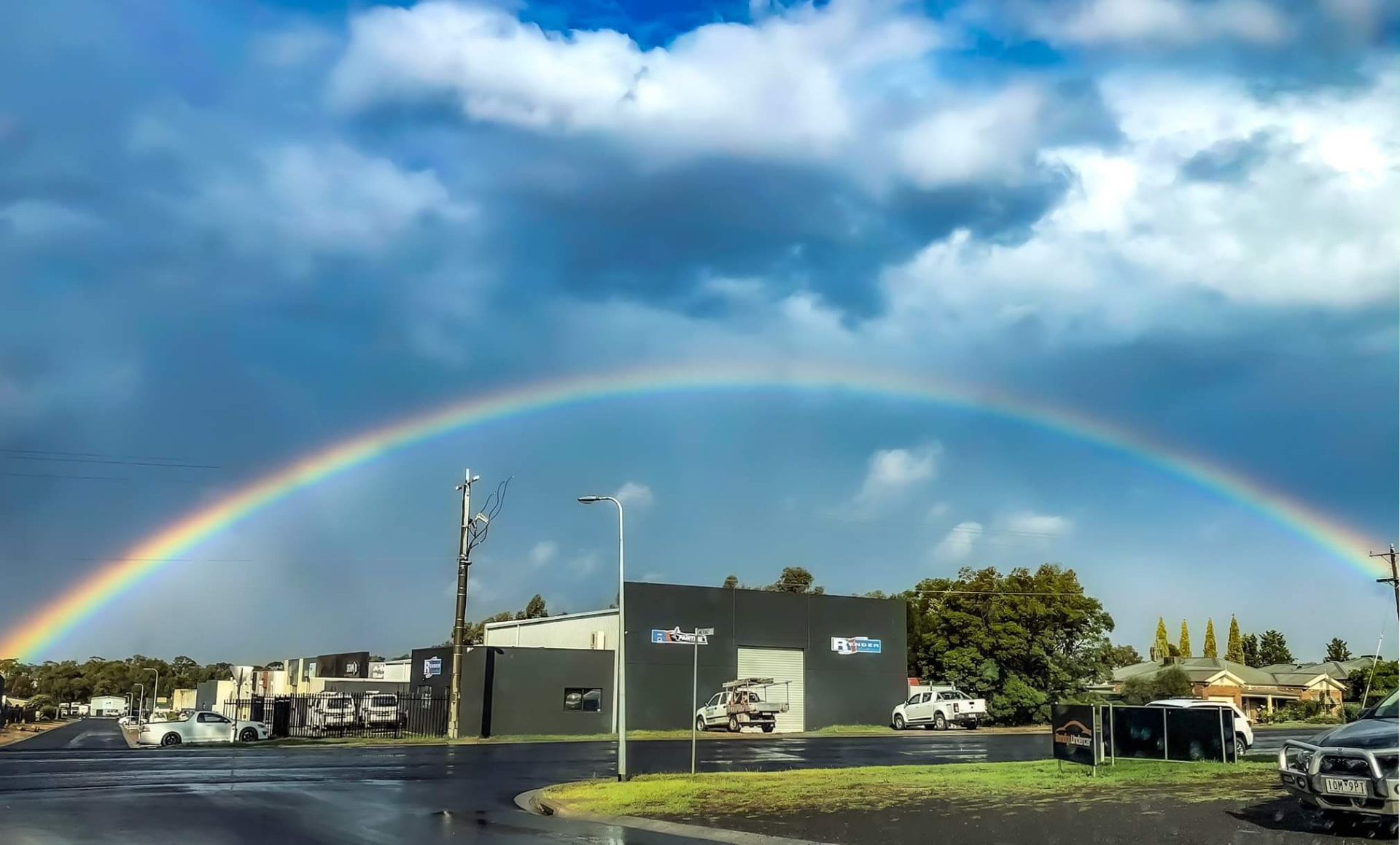 Render Solutions factory under a rainbow